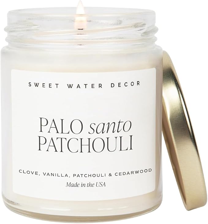 Sweet Water Decor Palo Santo Patchouli Candle - Soy Clove, Vanilla, Patchouli, Cedarwood Scented Spa Candles for Home -9oz Clear Jar + Gold Lid, 40+ Hour Burn Time, Made in The USA