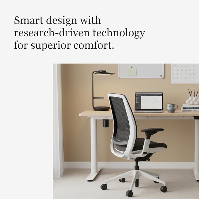 Steelcase Series 2 Office Chair - Ergonomic Work Chair with Wheels for Hard Flooring - with Back Support, Weight-Activated Adjustment & Arm Support - Adjustable Rolling Chairs for Desk - Graphite