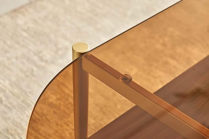 Shrine Oval Coffee Table, Mid-Century Modern Design, 2-Tier Structure, Amber Glass Top and Walnut MDF Shelf, 47" D x 21" W x 17" H, Sleek Conical Metal Legs with Gold Finish