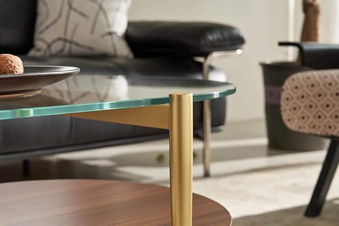 Shrine Oval Coffee Table, Mid-Century Modern Design, 2-Tier Structure, Clear Glass Top and Walnut MDF Shelf, 47" D x 21" W x 17" H, Sleek Conical Metal Legs with Gold Finish