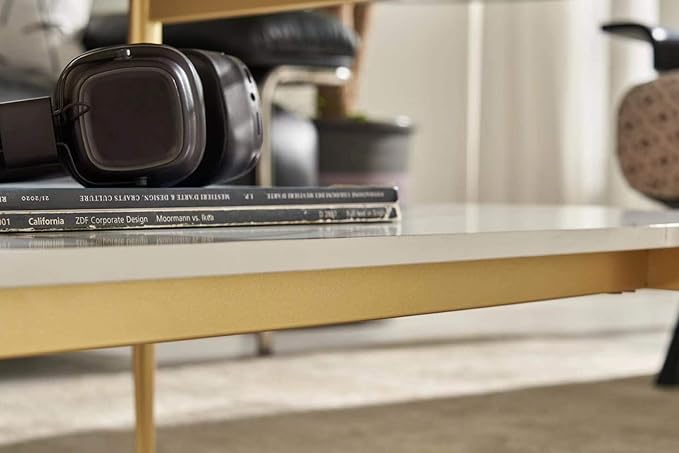 Shrine Oval Coffee Table, Mid-Century Modern Design, 2-Tier Structure, Clear Glass Top and White MDF Shelf, 47" D x 21" W x 17" H, Sleek Conical Metal Legs with Gold Finish