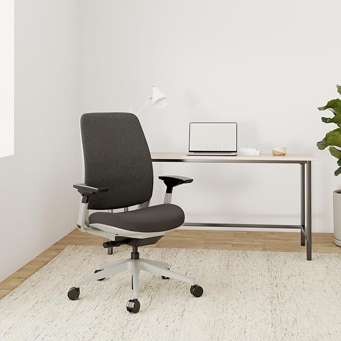 Steelcase Series 2 Office Chair - Ergonomic Work Chair with Wheels for Carpet - with Back Support, Weight-Activated Adjustment & Arm Support - Adjustable Rolling Chairs for Desk - Graphite