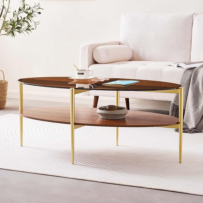 Oval Glass Coffee Table, Mid-Century Modern Design, L43 x W22 x H17 inch, 2-Tier Structure, Olive Shaped Amber Glass Top and Walnut Finish Wood Shelf, Tapered Legs with Gold Finish Frame