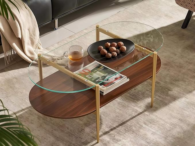 Shrine Oval Coffee Table, Mid-Century Modern Design, 2-Tier Structure, Clear Glass Top and Walnut MDF Shelf, 47" D x 21" W x 17" H, Sleek Conical Metal Legs with Gold Finish