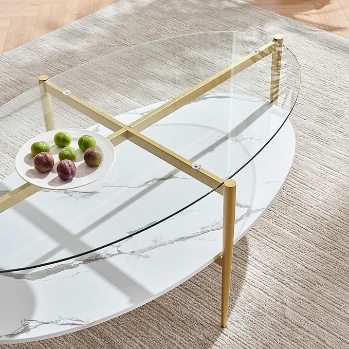 Oval Glass Coffee Table, Mid-Century Modern Design, L43 x W22 x H17 inch, Surfboard Shaped Clear Glass Top and White Marble Finish Wood Shelf, Tapered Legs with Gold Finish Frame