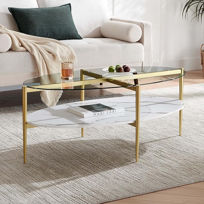 Oval Glass Coffee Table, Mid-Century Modern Design, L43 x W22 x H17 inch, Surfboard Shaped Clear Glass Top and White Marble Finish Wood Shelf, Tapered Legs with Gold Finish Frame