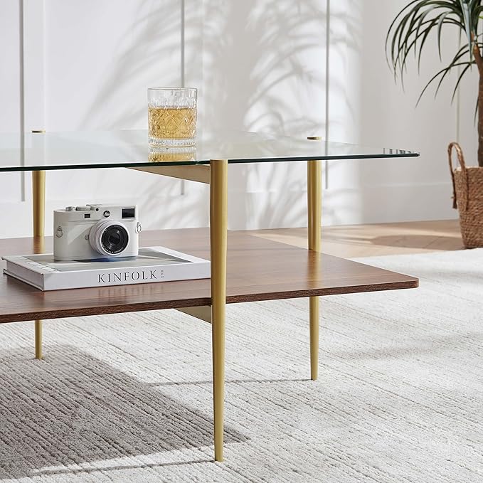 X-Large Oval Glass Coffee Table, Mid-Century Modern Design, L47 x W24 x H17 inch, for Living Room, Clear Glass Top and Walnut Finish Wood Shelf, Conical Legs with Gold Finish Frame