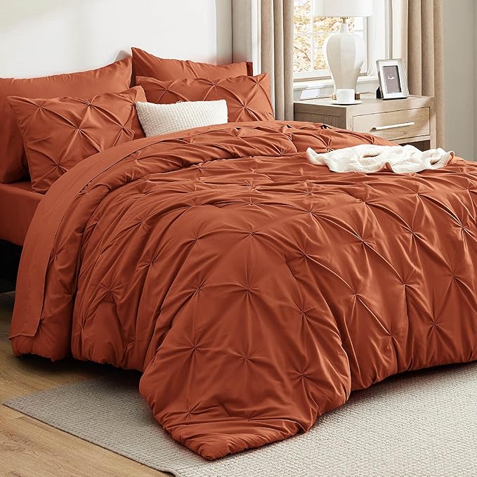 Bedsure Queen Comforter Set Burnt Orange - Bed in a Bag Queen Size Bedding 7 Pieces, GentleSoft™ Pintuck Bed Set Gift for Family, Pinch Pleat Burnt Orange Comforter with Sheets, Pillowcases & Shams