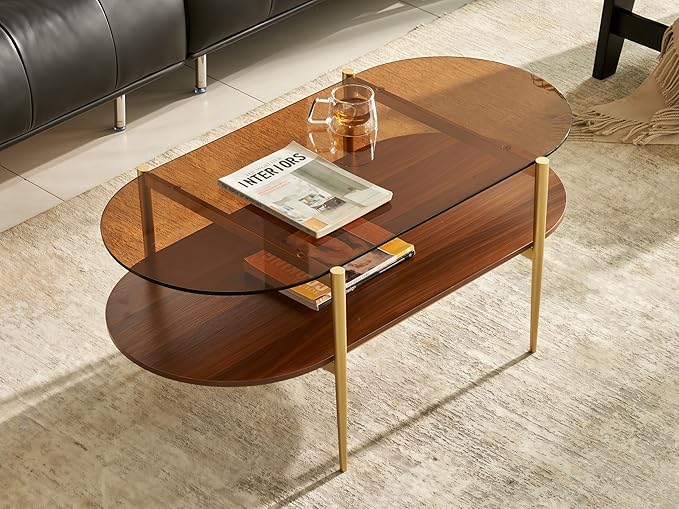 Shrine Oval Coffee Table, Mid-Century Modern Design, 2-Tier Structure, Amber Glass Top and Walnut MDF Shelf, 47" D x 21" W x 17" H, Sleek Conical Metal Legs with Gold Finish